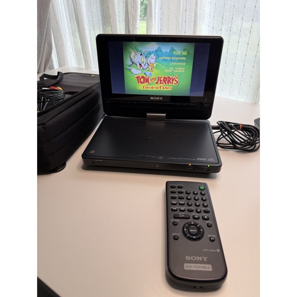 Sony Portable DVD Player DVP-FX810 W/ Remote, Adapter, Audio, Case & More WORKS